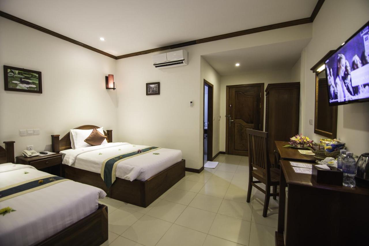 Kouprey Hotel Ciudad de Siem Riep Habitación foto