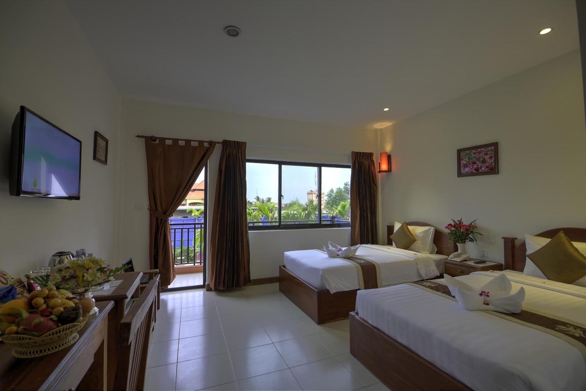 Kouprey Hotel Ciudad de Siem Riep Habitación foto